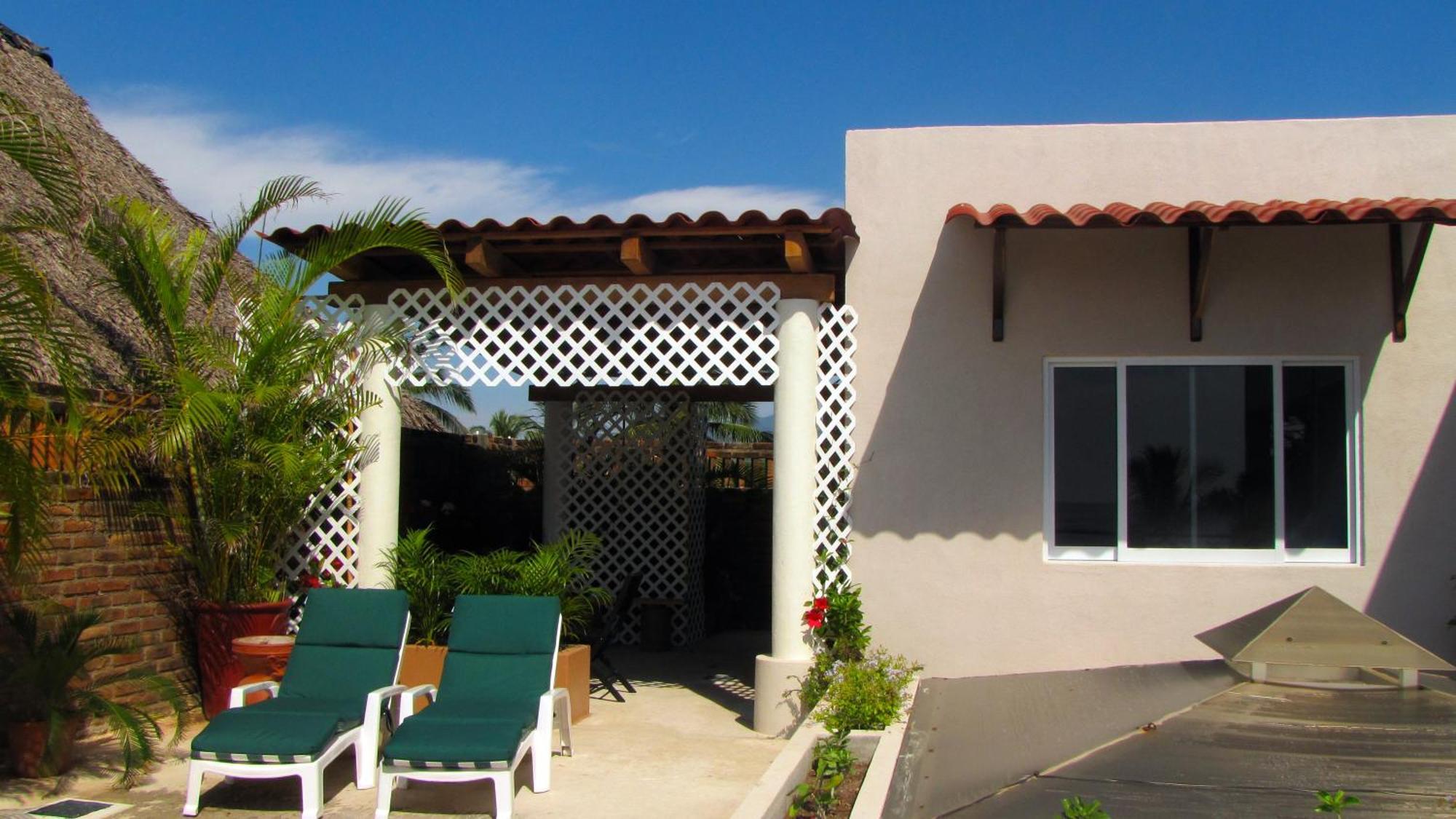 La Paloma Oceanfront Retreat Hotel San Patricio Melaque Quarto foto